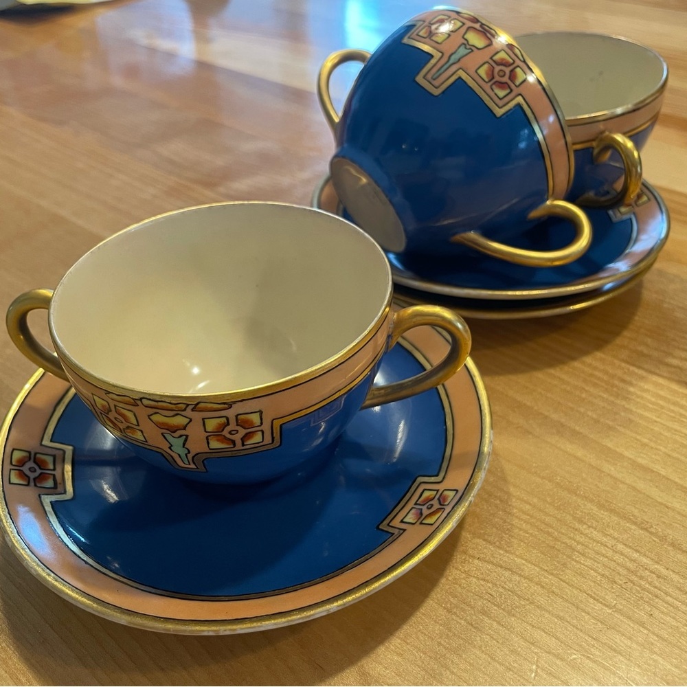 Limoges consommé bowls three, hand painted cerulean blue gold trim.